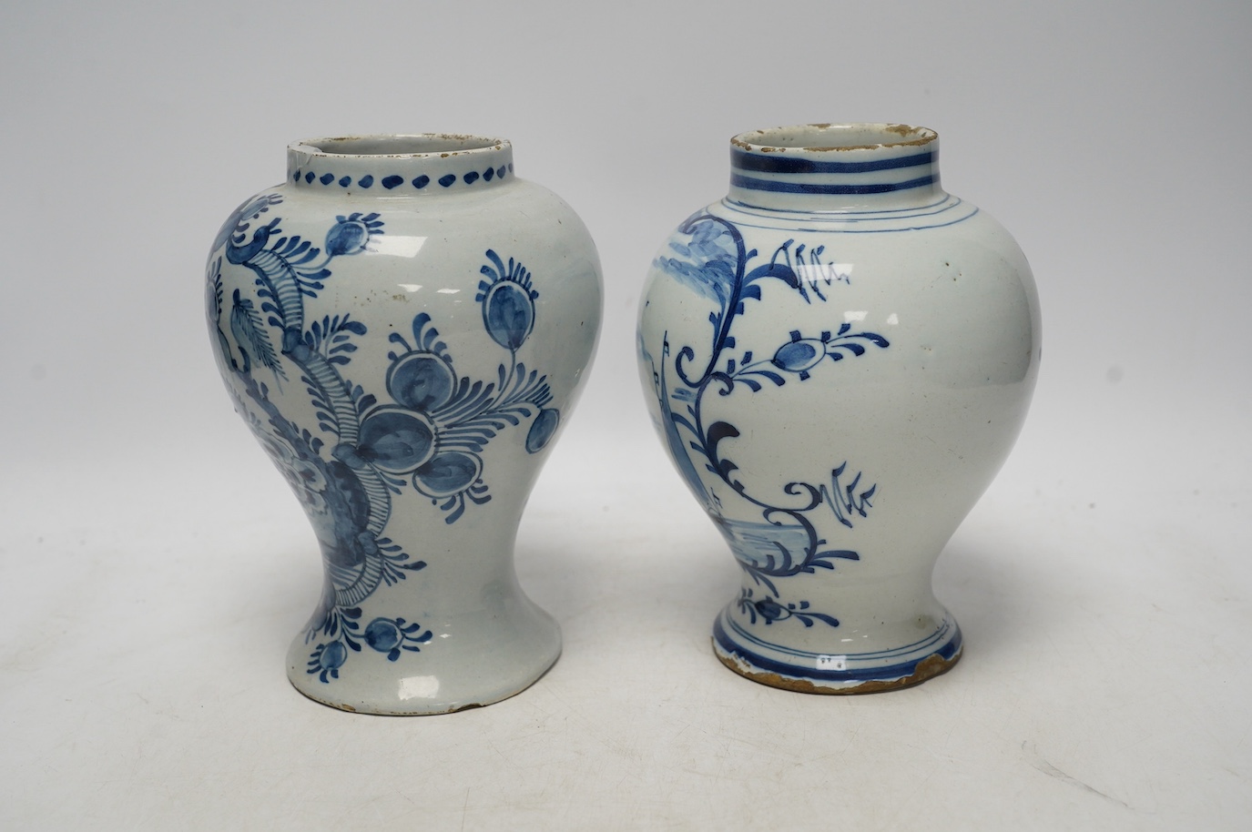 Two 18th century delft blue and white baluster vases, 18.5cm